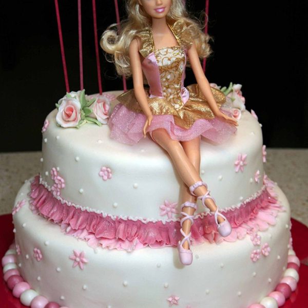 Barbie Sitting On A Cake