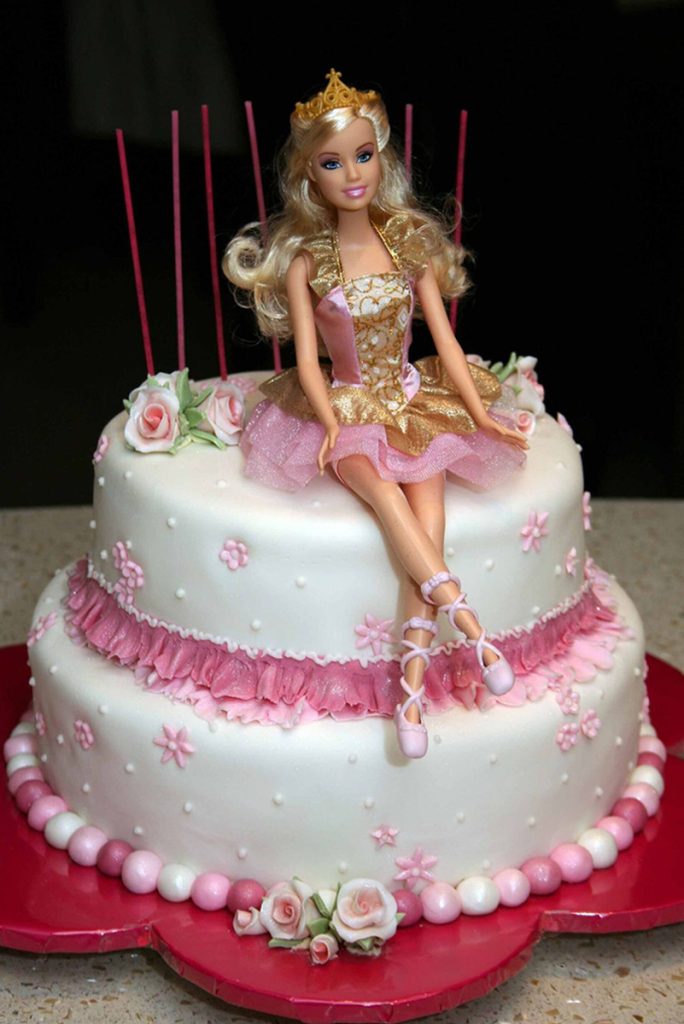 Barbie Sitting On A Cake