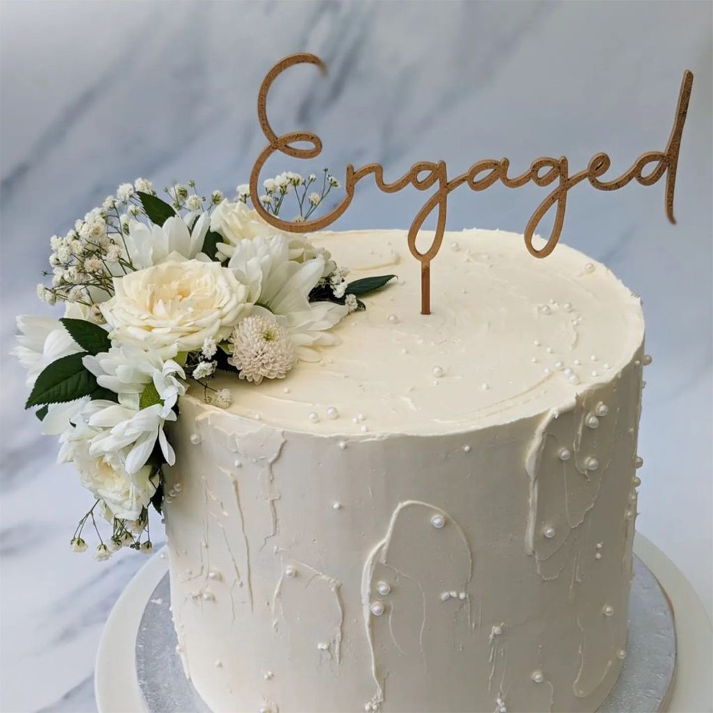 Tall Rose and Lilly Engagement Cake