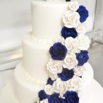 White and Navy Blue Roses Theme Wedding Cake